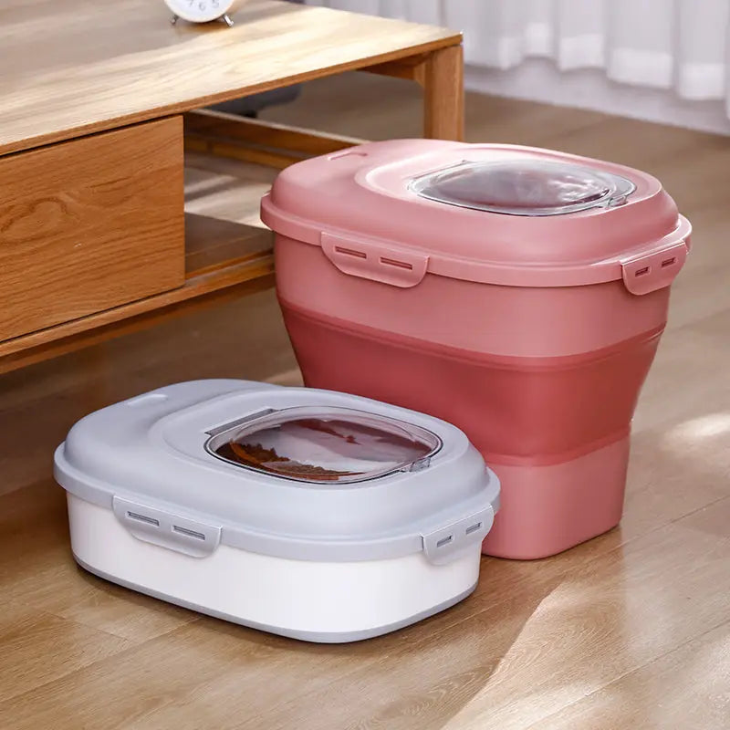 Collapsed grey and expanded pink pet food storage bins side by side